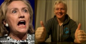 Try as she might, Hillary is no match for Julian Assange. (PHOTO: madnews)